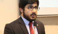 Research Associate of Research Society of International Law Mr. Abeer Mustafa giving pressentation