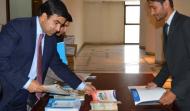 Ambassador of Afghanistan to Pakistan His Excellency Mr. Janan Mosazai on registration desk